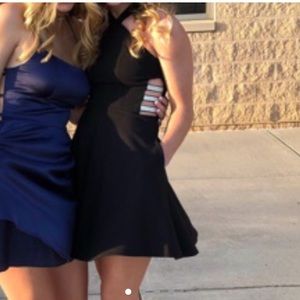 black high neck dress with side cutouts